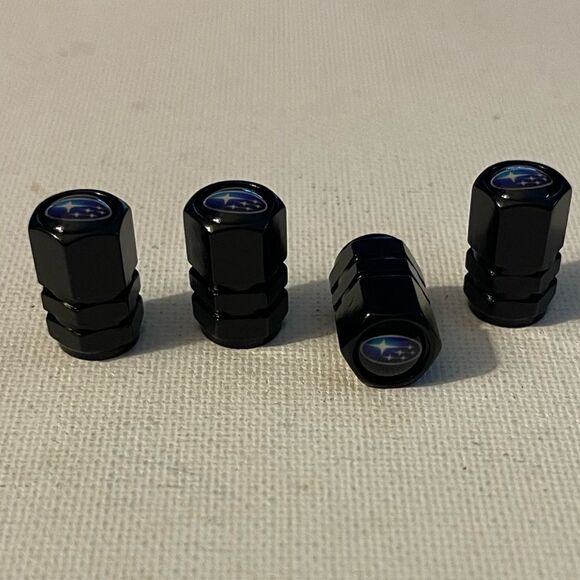 Subaru logo valve Stem caps in black set of 4 NWT - Picture 2 of 4